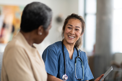 Doctor and patient laughing